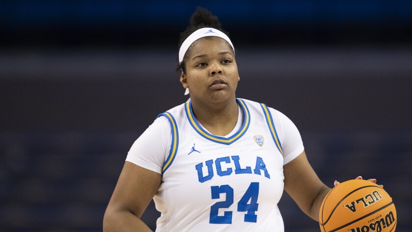 UCLA forward IImar'I Thomas dribbles during a game against Washington.