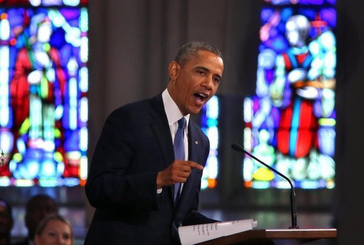 President Obama speaks at an interfaith service for victims of the Boston Marathon bombings at the Cathedral of the Holy Cross in Boston.