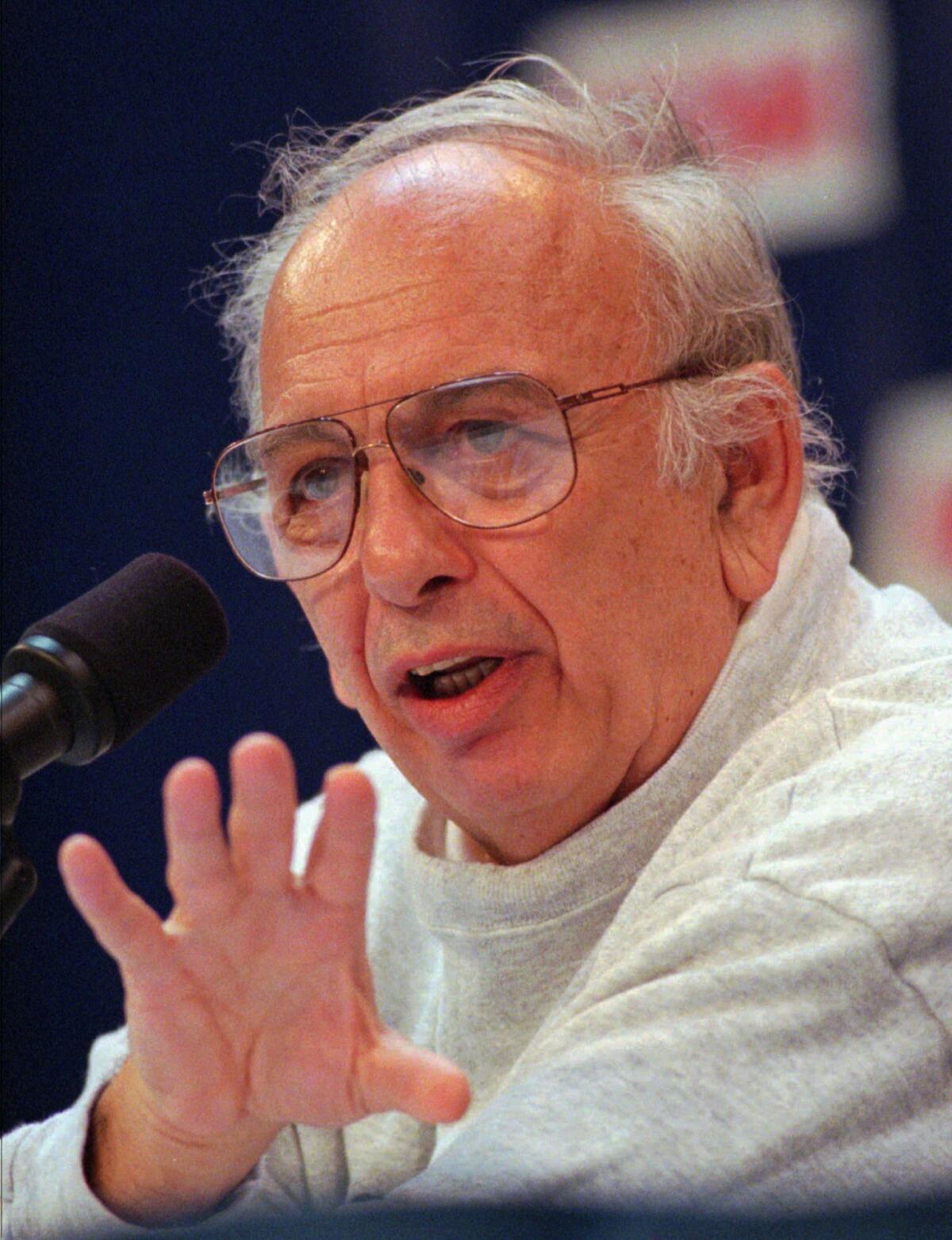 Princeton coach Pete Carril speaks during a news conference in March 1996.