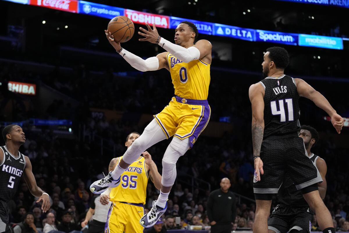 Lakers guard Russell Westbrook shoots during the first half against the Sacramento Kings.