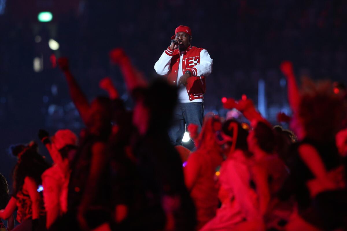 Rapper Dizzee Rascal performs at the Olympics opening ceremony.