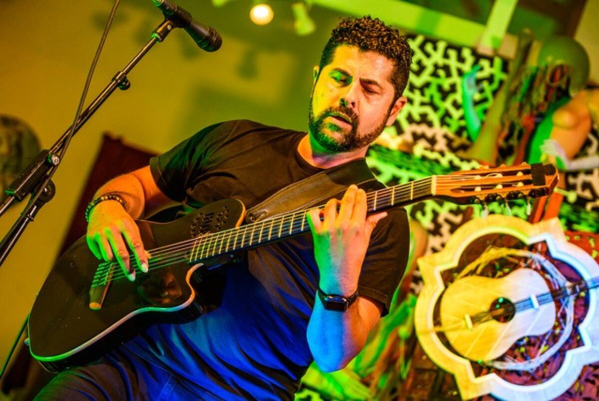 Israel Maldonado plays during a DharmaDen "TunedUp" session in February.