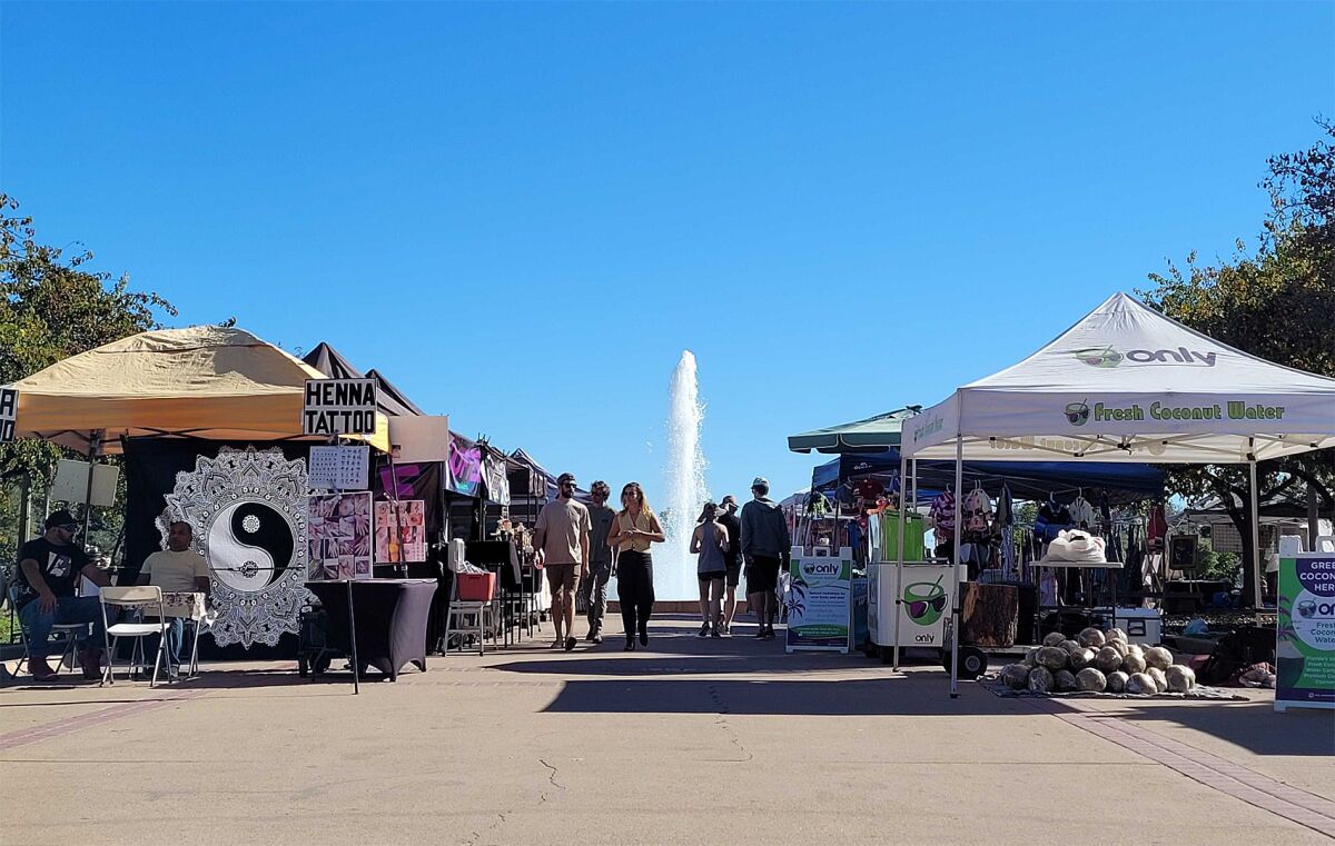 On a recent weekend, vendors filled Balboa Park's Prado.