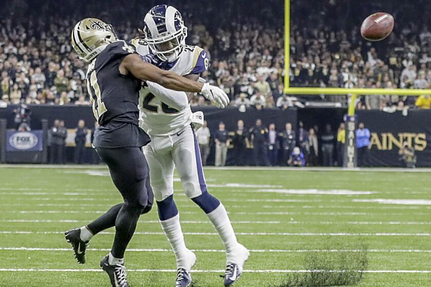 NEW ORLEANS, LOUISIANA, SUNDAY, JANUARY 20, 2019 - Rams cornerback Nickell Robey-Coleman seems to deliver an early hit to Saints rexeiver Tommylee Lewis late in the fourth quarter, thwarting a potential game-winning drive in the NFC Championship at the Superdome. (Robert Gauthier/Los Angeles Times)