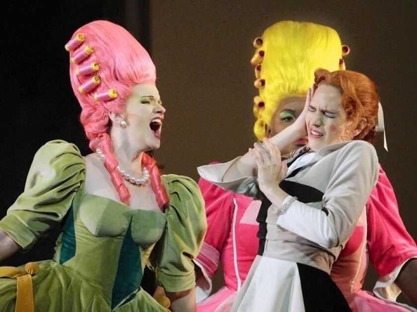 Stacey Tappan as Clorinda, left, and Ronnita Nicole Miller as Tisbe, center, as the spoiled sisters and Kate Lindsey as Angelina/Cinderella in L.A. Opera's "Cinderella" at the Dorothy Chandler Pavilion in Los Angeles.