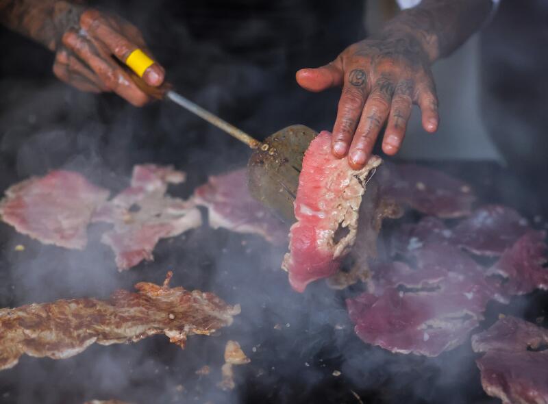 Detail of Gaonera meat while it is grilled during a visit to 'El Califa de León' in