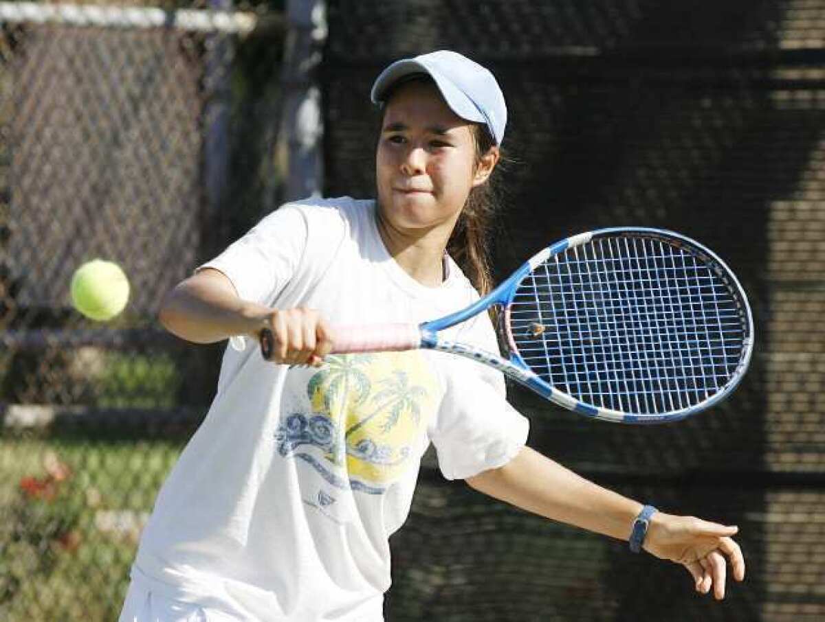 La Canada's Sawa Keymeulen strokes a backhand return against Flintridge Sacred Heart Academy.