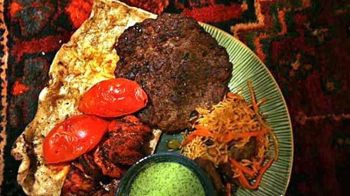 AFGHAN: Chaplee beef kebab with traditional nan bread.