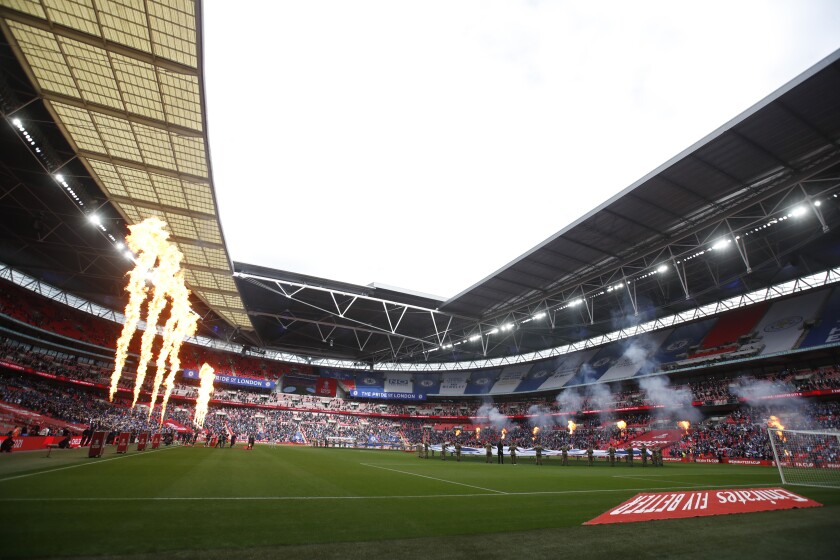 The teams enter the field for the FA Cup final soccer match between Chelsea and Leicester City at Wembley Stadium in London, England, Saturday, May 15, 2021. (Matt Childs/Pool via AP)