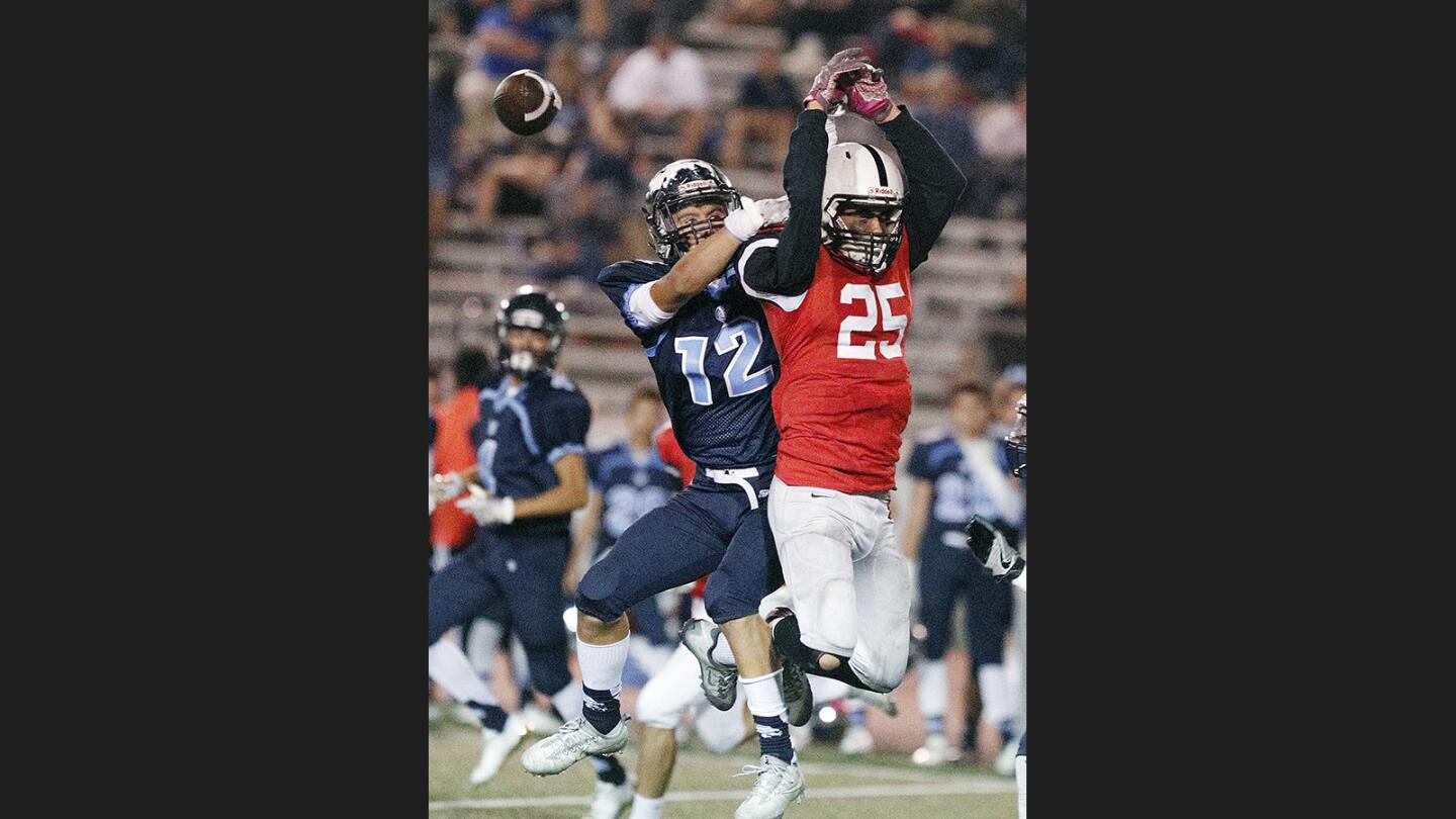 Photo Gallery: Crescenta Valley vs. Glendale in Pacific League football and the Crescenta Valley marching band takes the field in Halloween costumes