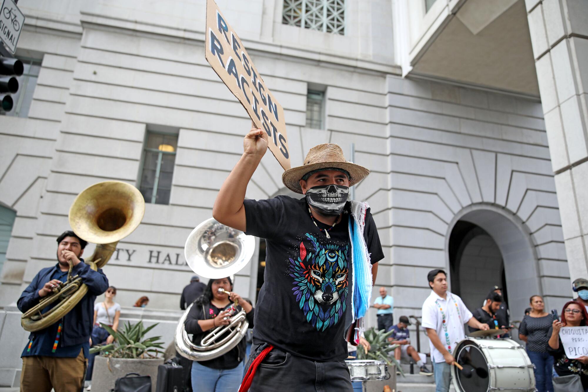 A traditional Oaxaquena band plays while protestors block Main Street during the Los Angeles City Council meeting.