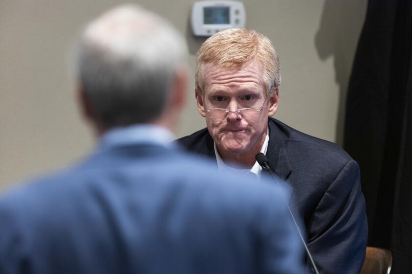 Alex Murdaugh is cross examined by prosecutor Creighton Waters after taking the stand during his murder trial at the Colleton County Courthouse in Walterboro, S.C., on Thursday, Feb. 23, 2023. The 54-year-old attorney is standing trial on two counts of murder in the shootings of his wife and son at their Colleton County, S.C., home and hunting lodge on June 7, 2021. (Joshua Boucher/The State via AP, Pool)