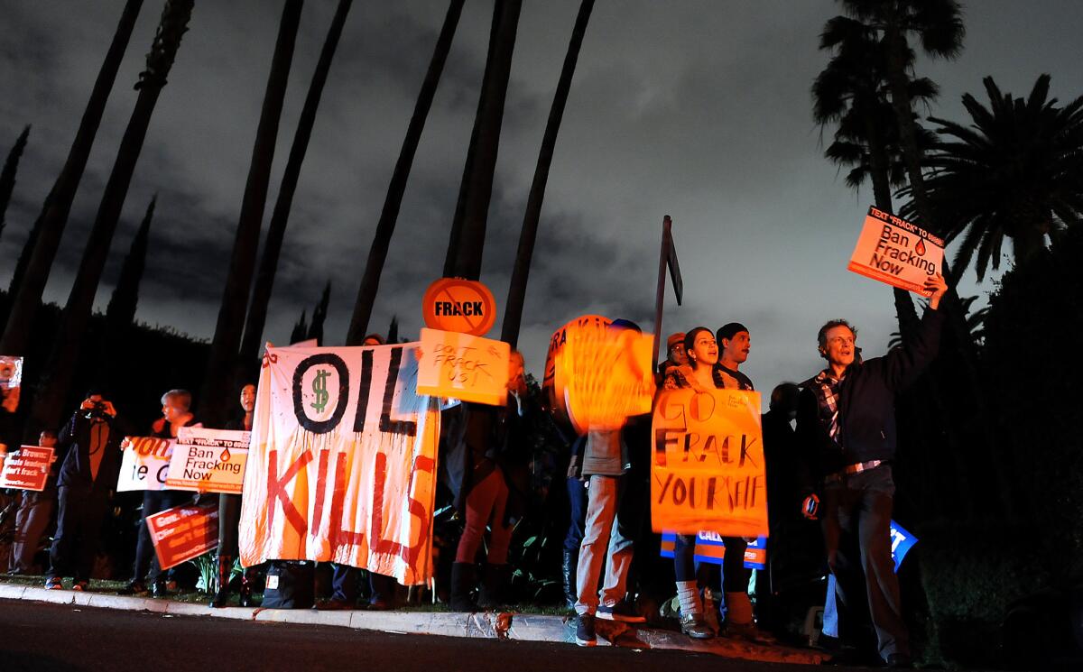 Environmentalists protest outside a home in Bel-Air where Gov. Jerry Brown attended a fundraiser last November. The protestors were calling for a ban on fracking.