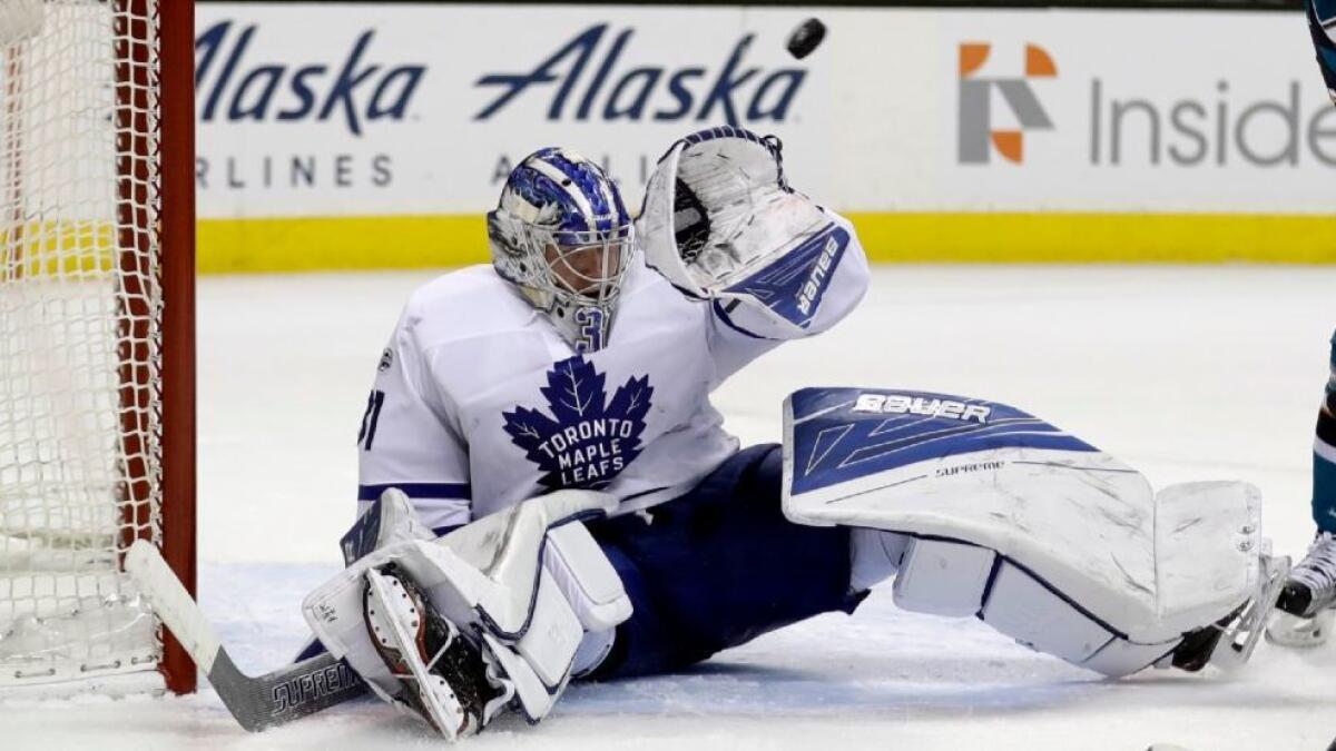 Maple Leafs goalie Frederik Andersen (31) deflects a San Jose Sharks shot during the second period of a game on Feb. 28.