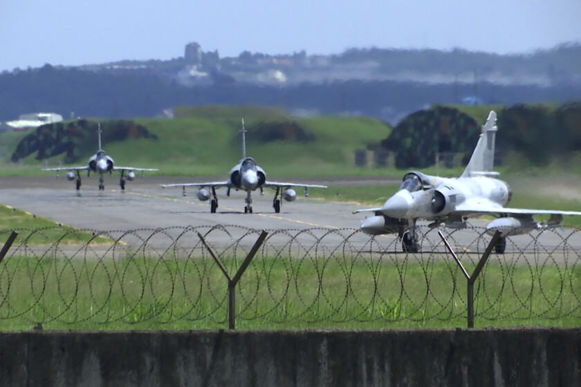 Taiwan Air Force Mirage fighter jets taxi on a runway in Taiwan on Friday.