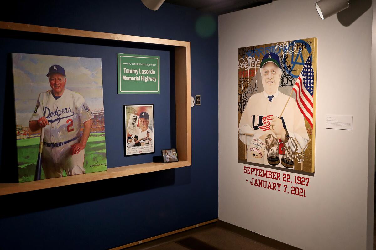 Portraits of Los Angeles Dodgers legend Tommy Lasorda, at exhibit at Fullerton Museum Center. (Kevin Chang / TimesOC)