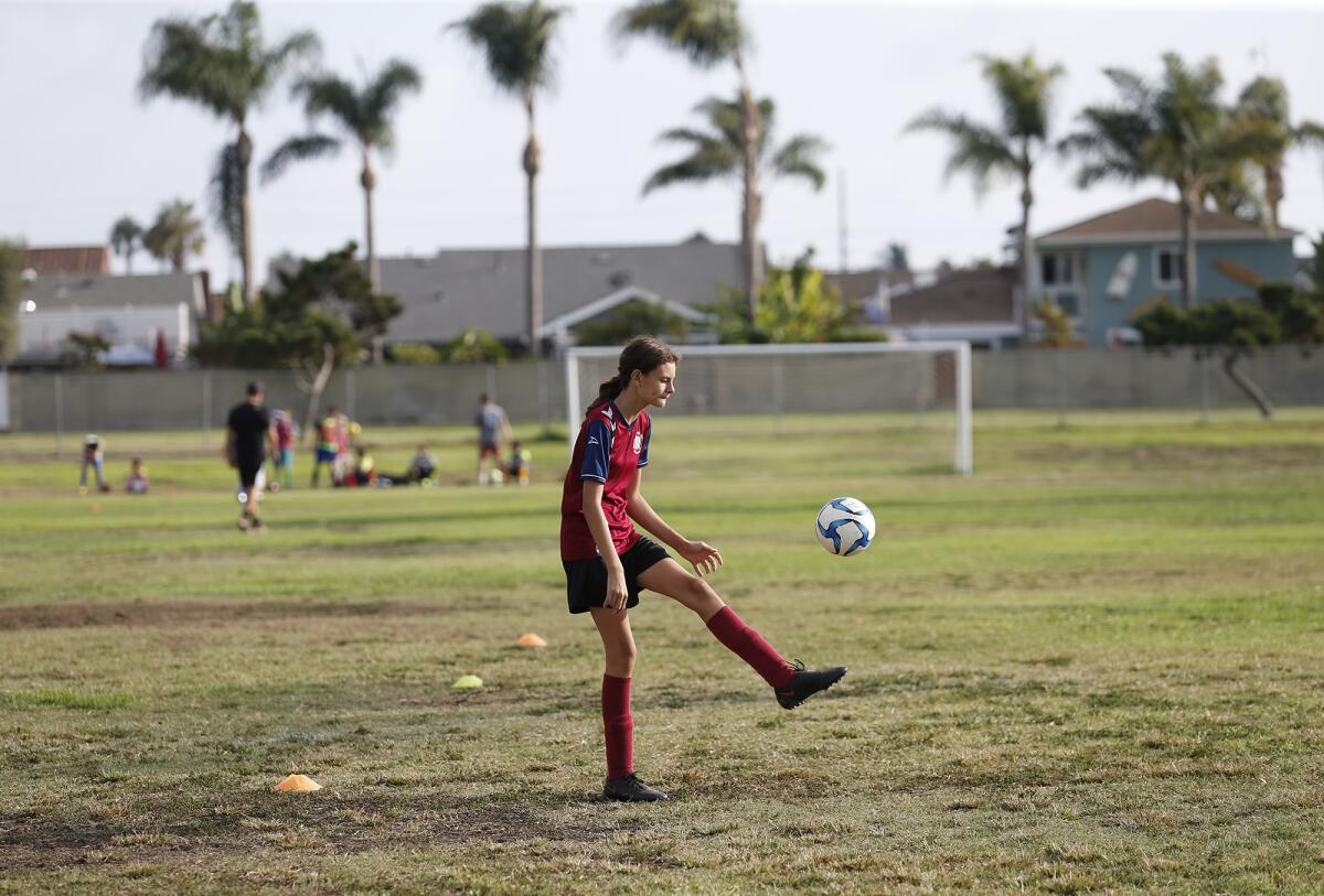 Remy Kluwe warms up for practice on the soccer fields at the site of the former Gisler Middle School on Tuesday.