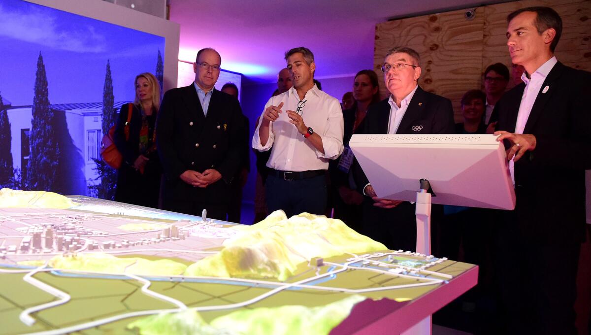 Casey Wasserman (center, white shirt) and Major Eric Garcetti give an LA 2024 presentation to the IOC on Aug. 16 in Rio de Janeiro.