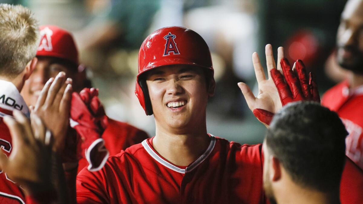 Shohei Ohtani hit two homers against the Rangers.