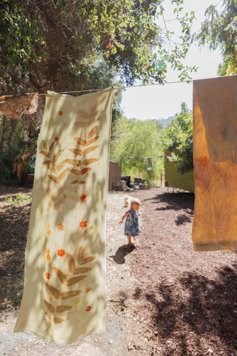 Sixteen-month-old Lasca runs around barefoot.