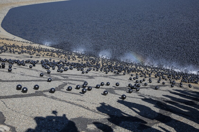 L.A. Mayor Eric Garcetti releases 20,000 "shade balls" into the Los Angeles Reservoir on Monday.