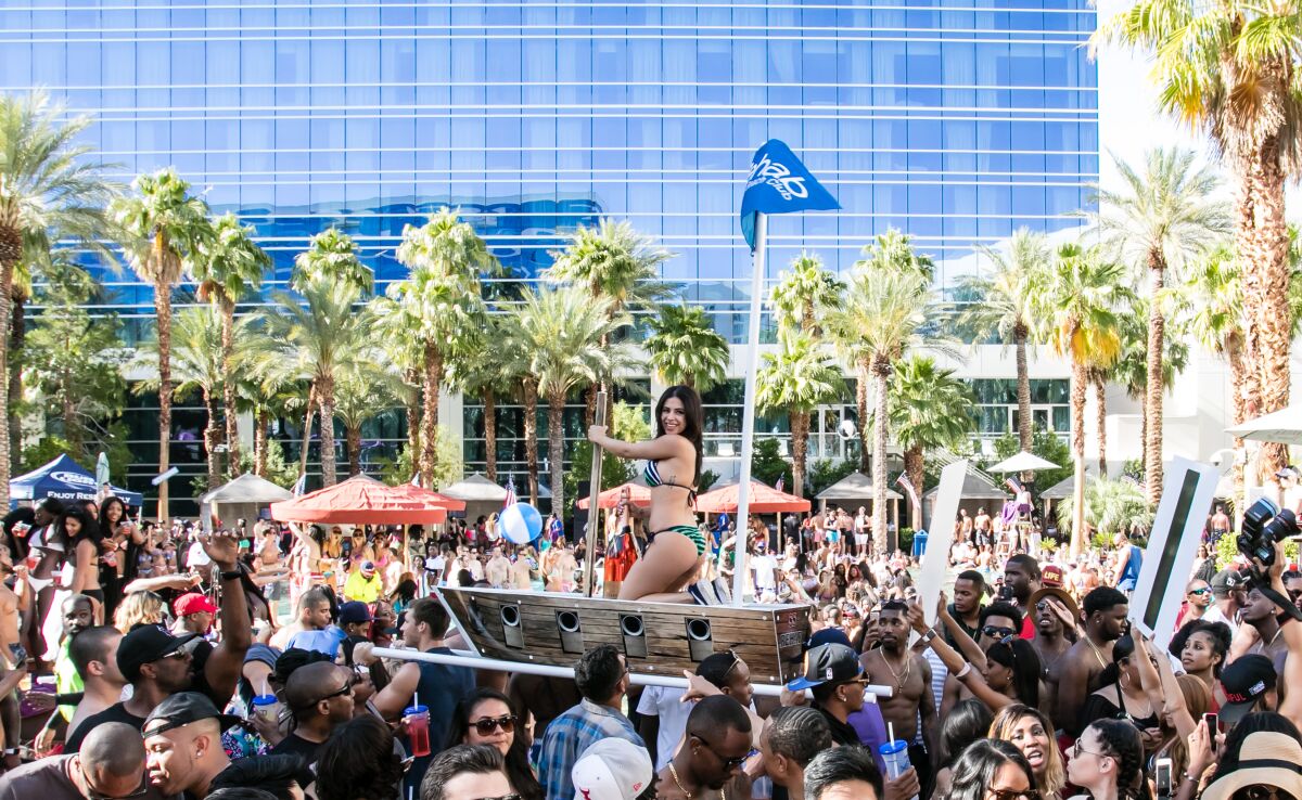Crowds party to the music on Memorial Day, 2016, at Rehab Beach Club in Las Vegas.