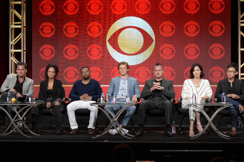 CBS fall series "MacGyver" executive producer Peter Lenkov, left, with Tristin Mays, Justin Hires, Lucas Till, George Eads, Sandrine Holt and executive producer/director James Wan during the Television Critics Assn. press tour.