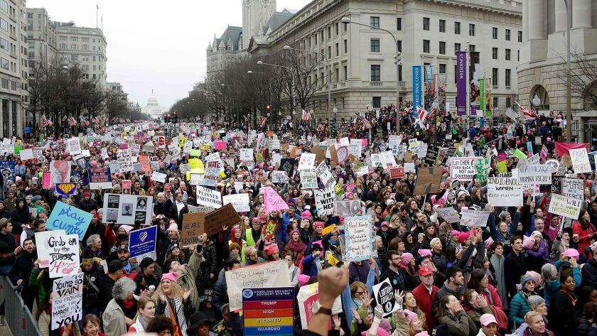 Demonstrators gather for the inaugural Women's March in Washington, D.C., on Jan. 21, 2017, when people worldwide showed their opposition to President Trump.