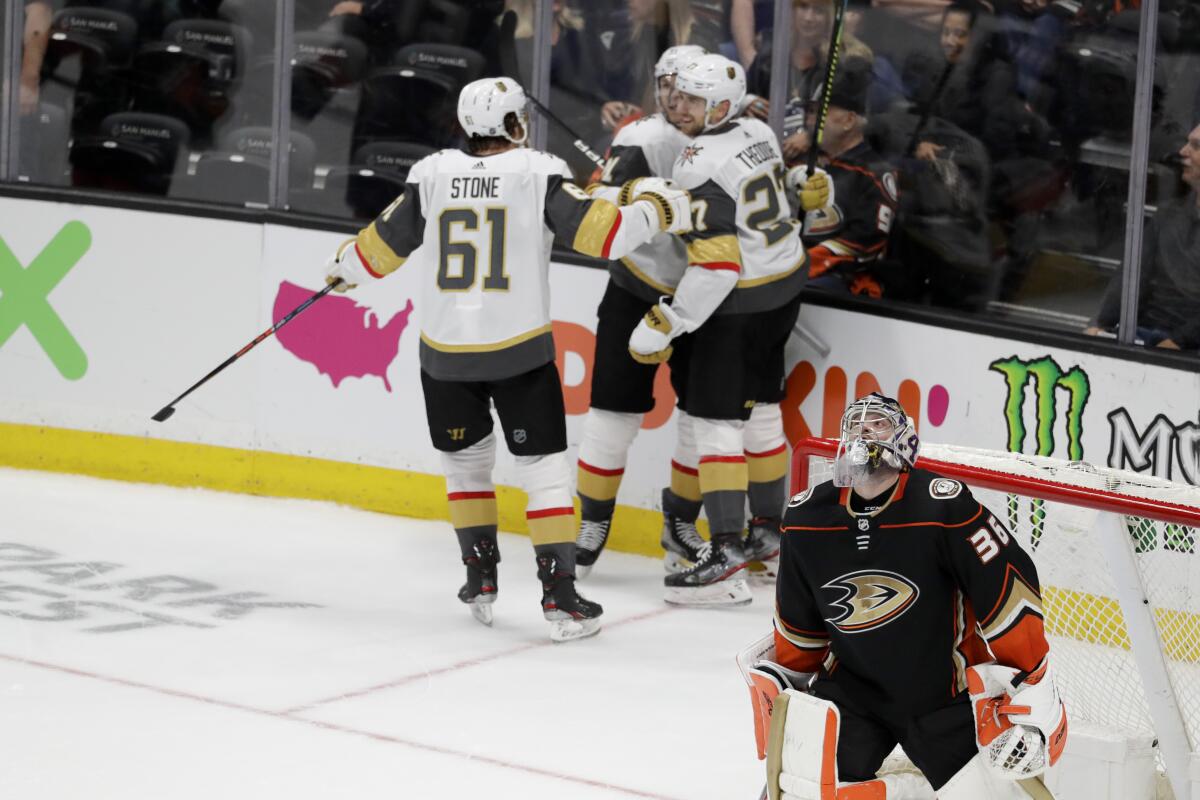 Ducks goaltender John Gibson reacts after giving up the winning goal to Vegas Golden Knights defenseman Shea Theodore in overtime of a 6-5 loss Sunday.