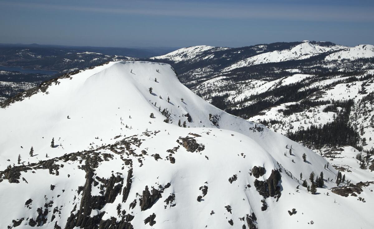 Record snowfall covers the Sierra Nevada mountains. A snow survey at the Meadow Lake snow course revealed the area received 160% of average precipitation. (Myung J. Chun / Los Angeles Times)
