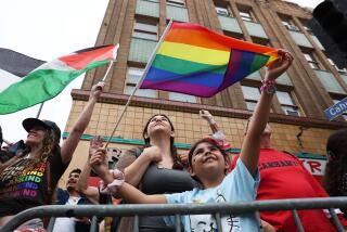 Los Angeles, CA - Spectators lined Hollywood and Highland boulevards as about 5,000 people would march in the parade this year LA's Pride Parade on Sunday, June 9, 2024 in Los Angeles, CA. (Robert Gauthier / Los Angeles Times)