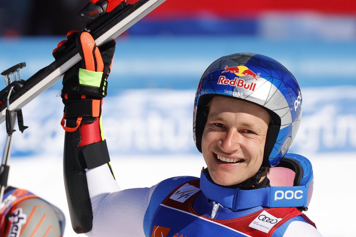 Switzerland's Marco Odermatt reacts after completing an alpine ski, men's World Cup giant slalom race, in Kranjska Gora, Slovenia, Sunday, March 13, 2022. (AP Photo/Giovanni Pizzato)