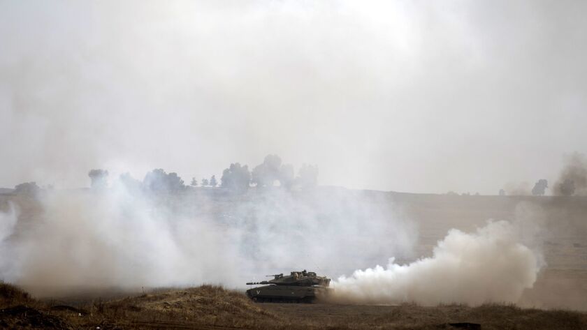 Israeli tanks train in the Golan Heights on the Israeli-Syrian border on Oct. 16.
