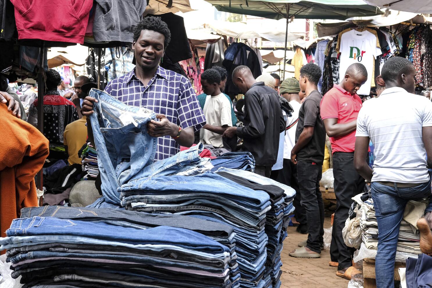 Used clothing from the West is a big seller in East Africa. Uganda's leader  wants a ban - The San Diego Union-Tribune