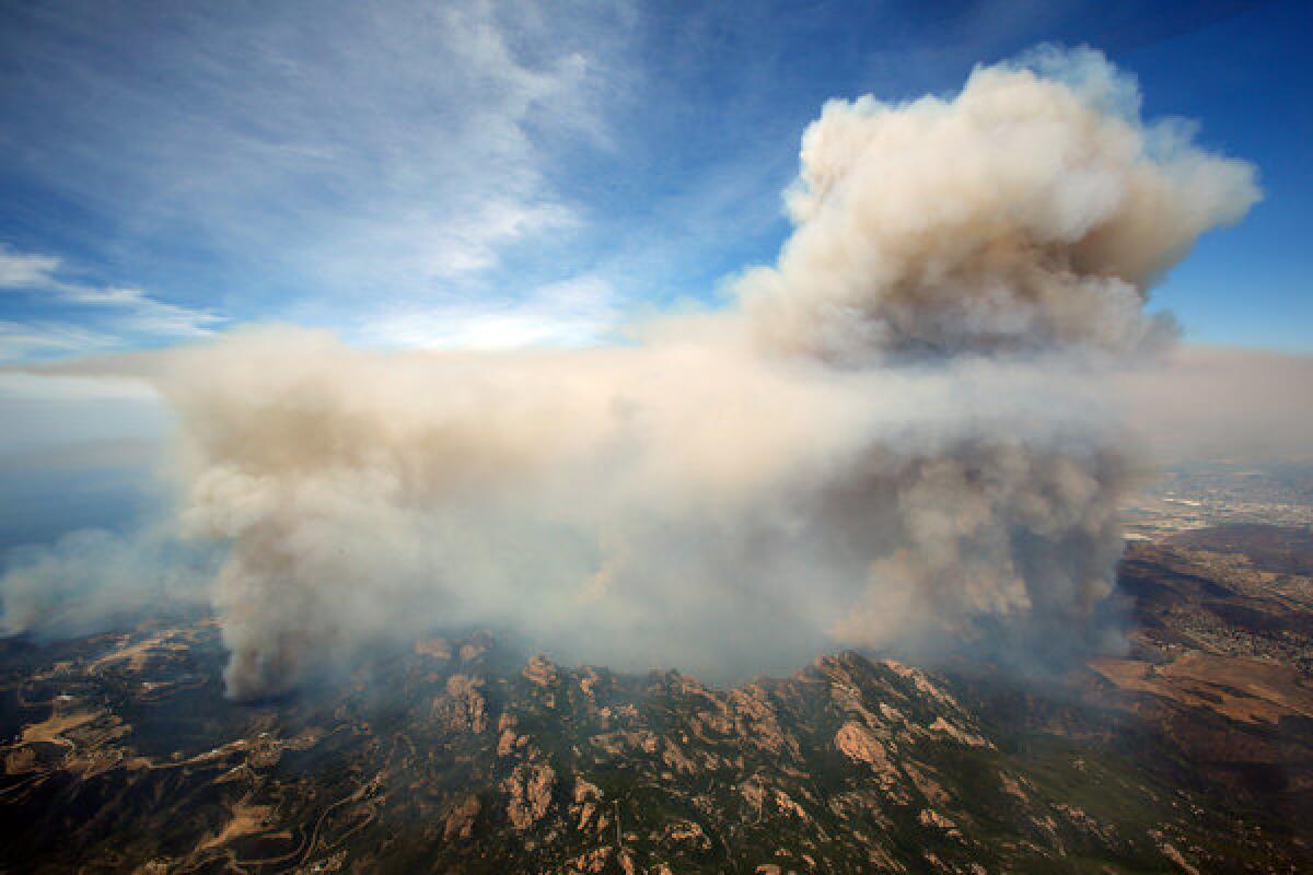An aerial view of the Springs fire burning in the Santa Monica Mountains between Malibu and Newbury Park on Friday.