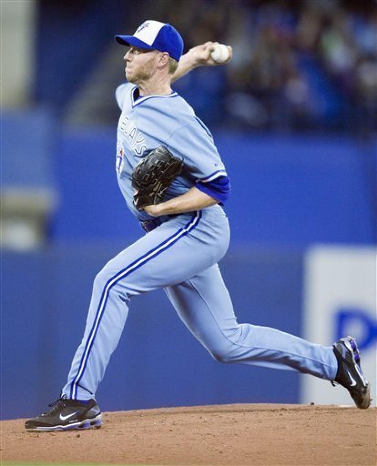 Halladay earns fifth win as Blue Jays beat Orioles - The San Diego  Union-Tribune