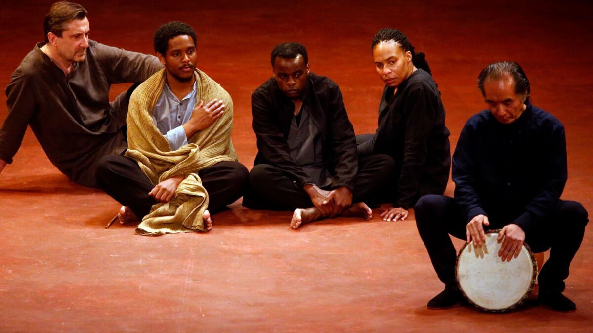 From left, Sean O'Callaghan, Jared McNeill, Ery Nzaramba, Karen Aldridge and Toshi Tsuchitori perform the final scene of Peter Brook's "Battlefield" at the Wallis Annenberg Center for the Performing Arts.