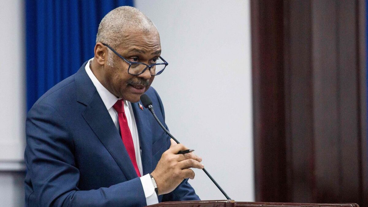Haitian Prime Minister Jack Guy Lafontant during his speech to the deputies in Port-au-Prince, Haiti, July 14, 2018, in which he announced his resignation to the nation.
