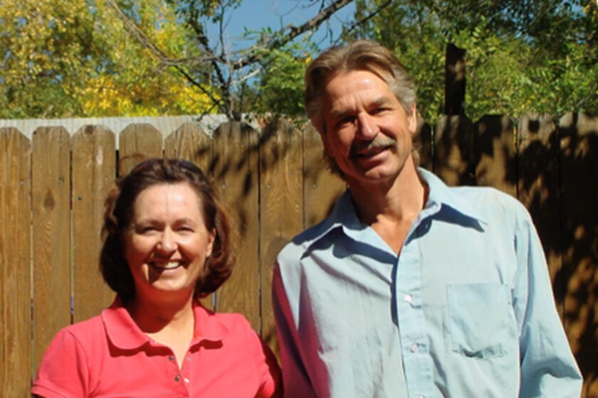 In this Oct. 1, 2005, family photo provided by Ray Ritchie, Eileen Fournier, left, and her brother Robert Sharpe pose for a picture. Sharpe was spotted in December 2021 trying to fight a wildfire and waved off at least one warning for him to evacuate his home in a semi-rural area near Boulder, Colo., according to his brother Milt Sharpe. His remains were found inside his home a week after the Dec. 30 fire tore through the area. (Ray Ritchie via AP)