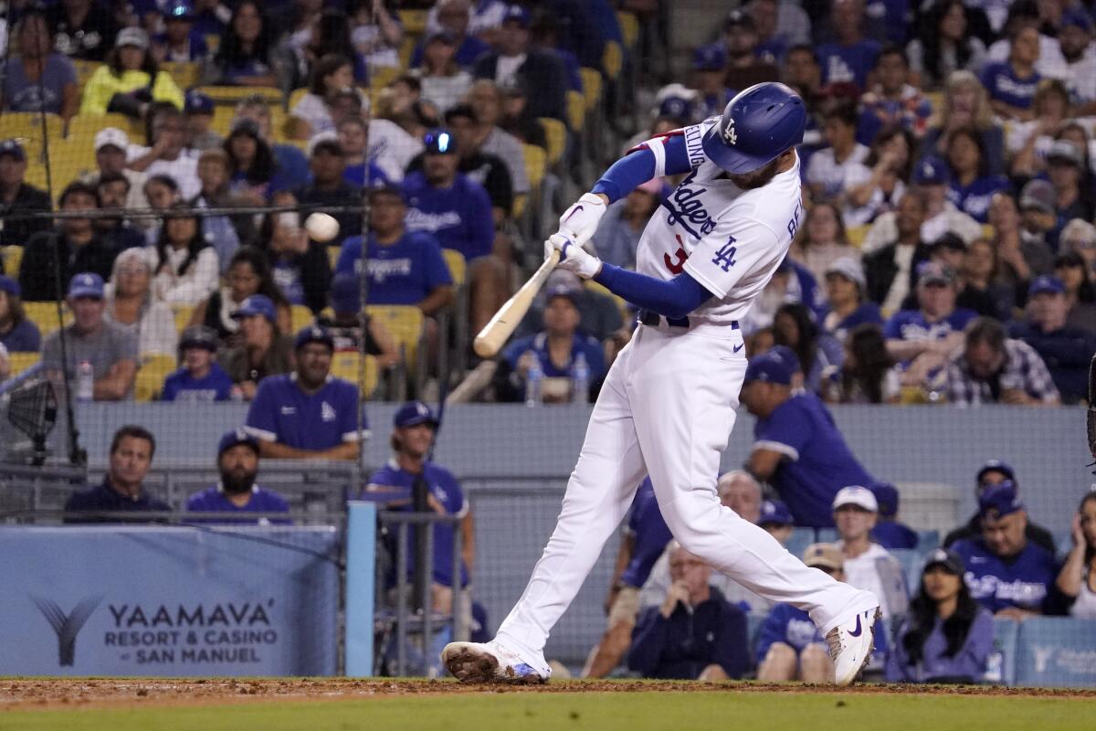 Cody Bellinger hits a three-run home run during the fourth inning of the Dodgers' 10-1 win.