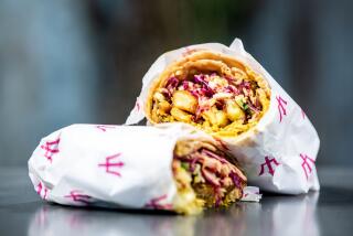 LOS ANGELES, CA - OCTOBER 27: Roti wrap from Bridgetown Roti, located inside Crafted Kitchen on Tuesday, Oct. 27, 2020 in Los Angeles, CA. (Mariah Tauger / Los Angeles Times)