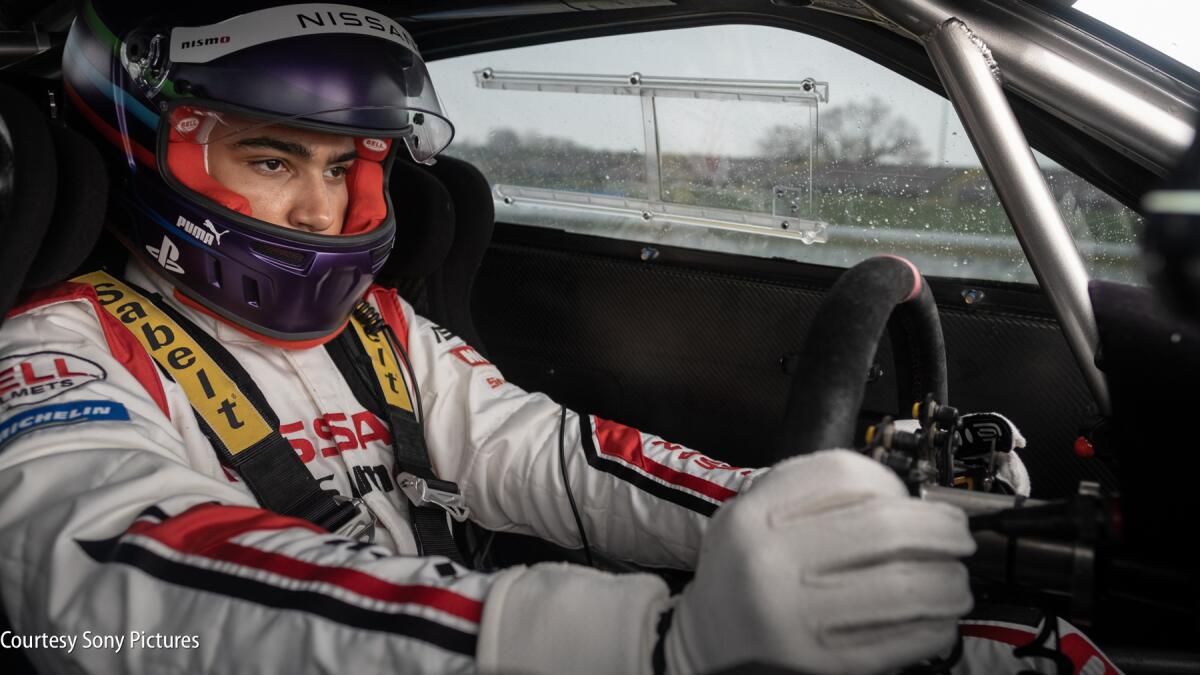 Jann Mardenborough (Archie Madekwe) at the wheel of his Nissan racecar.