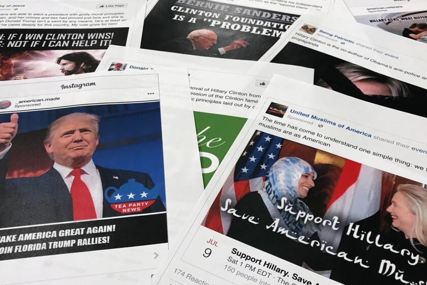 Some of the Facebook and Instagram ads linked to a Russian effort to disrupt the American political process and stir up tensions around divisive social issues, released by members of the U.S. House Intelligence committee, are photographed in Washington, on Wednesday, Nov. 1, 2017. A report compiled by private researchers and released by the Senate intelligence committee Monday says that "active and ongoing" Russian interference operations still exist on social media platforms, and that the Russian operation discovered after the 2016 presidential election was much broader than once thought. (AP Photo/Jon Elswick)