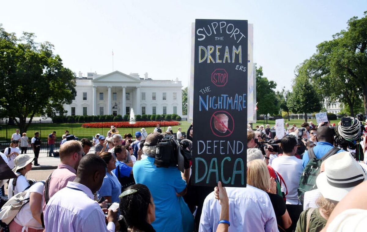 Demonstrators supporting a legal path for so-called Dreamers gather outside the White House.