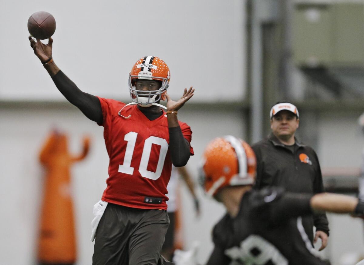Vince Young throws a pass during a voluntary mini-camp with the Cleveland Browns in Brea, Ohio.