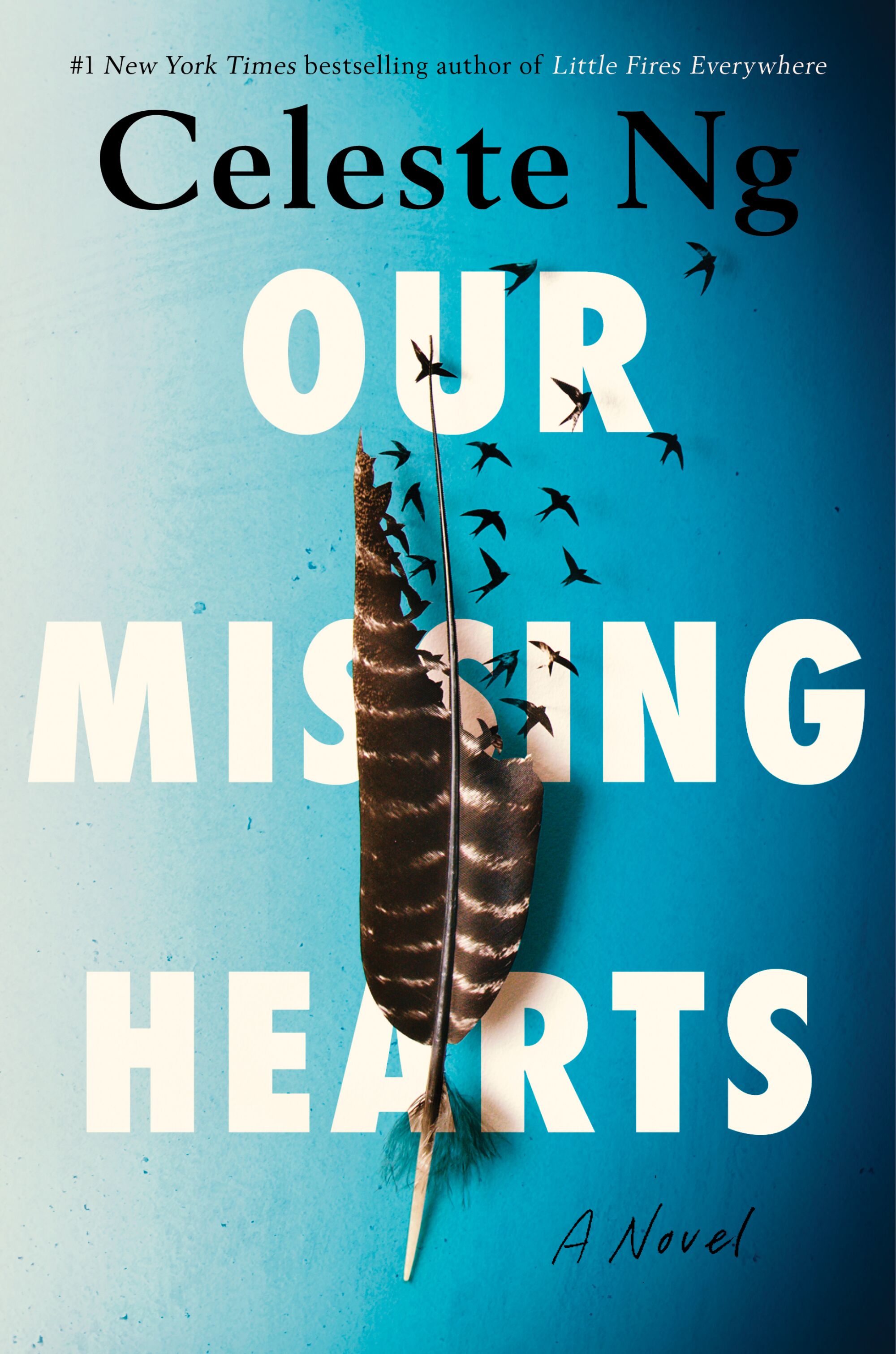 Feather on the words on the cover of "Our missing hearts" by Celeste Ng