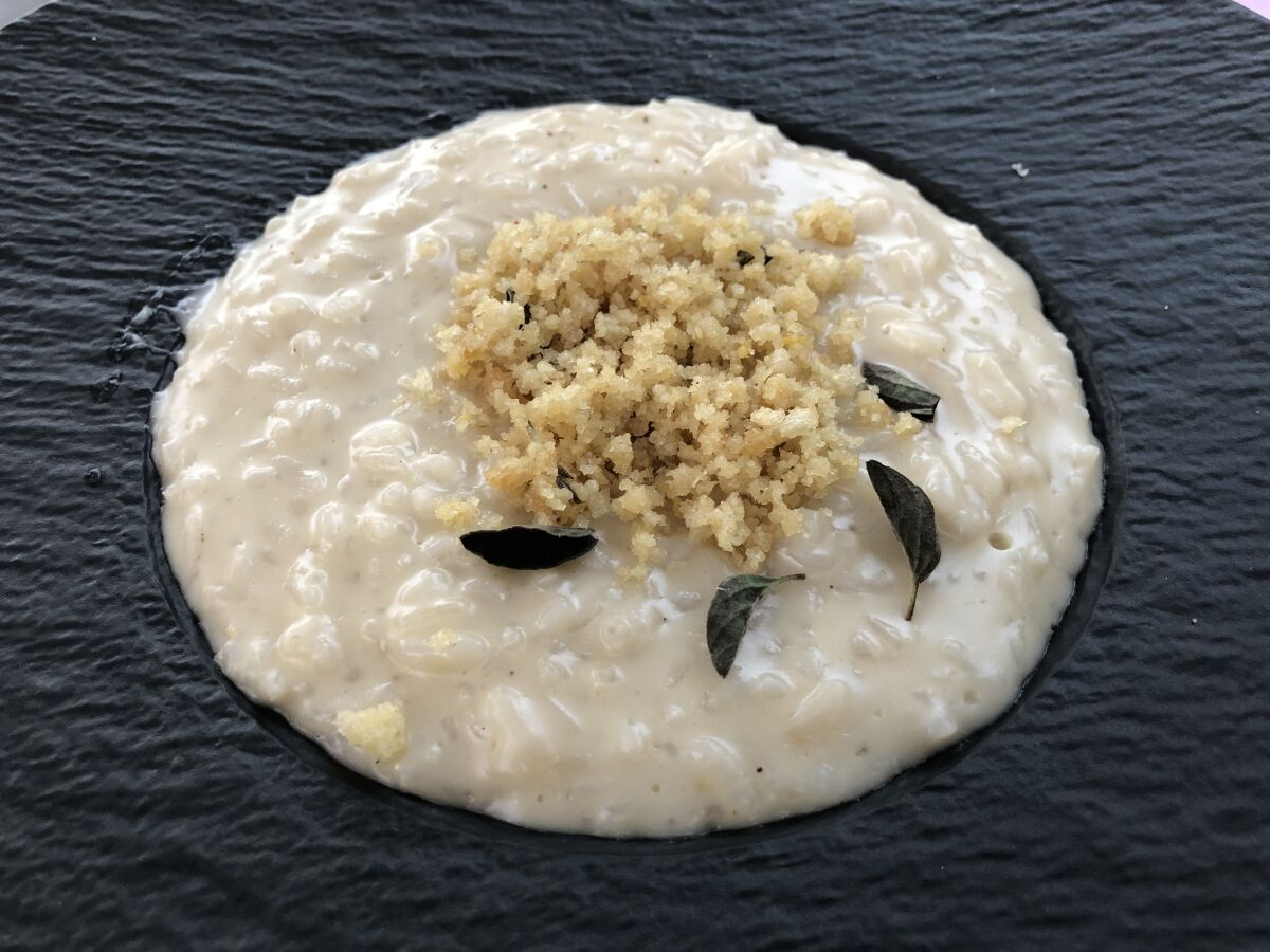 Semola's fugazzeta risotto is inspired by the Argentine onion-topped stuffed pizza known as fugazza.