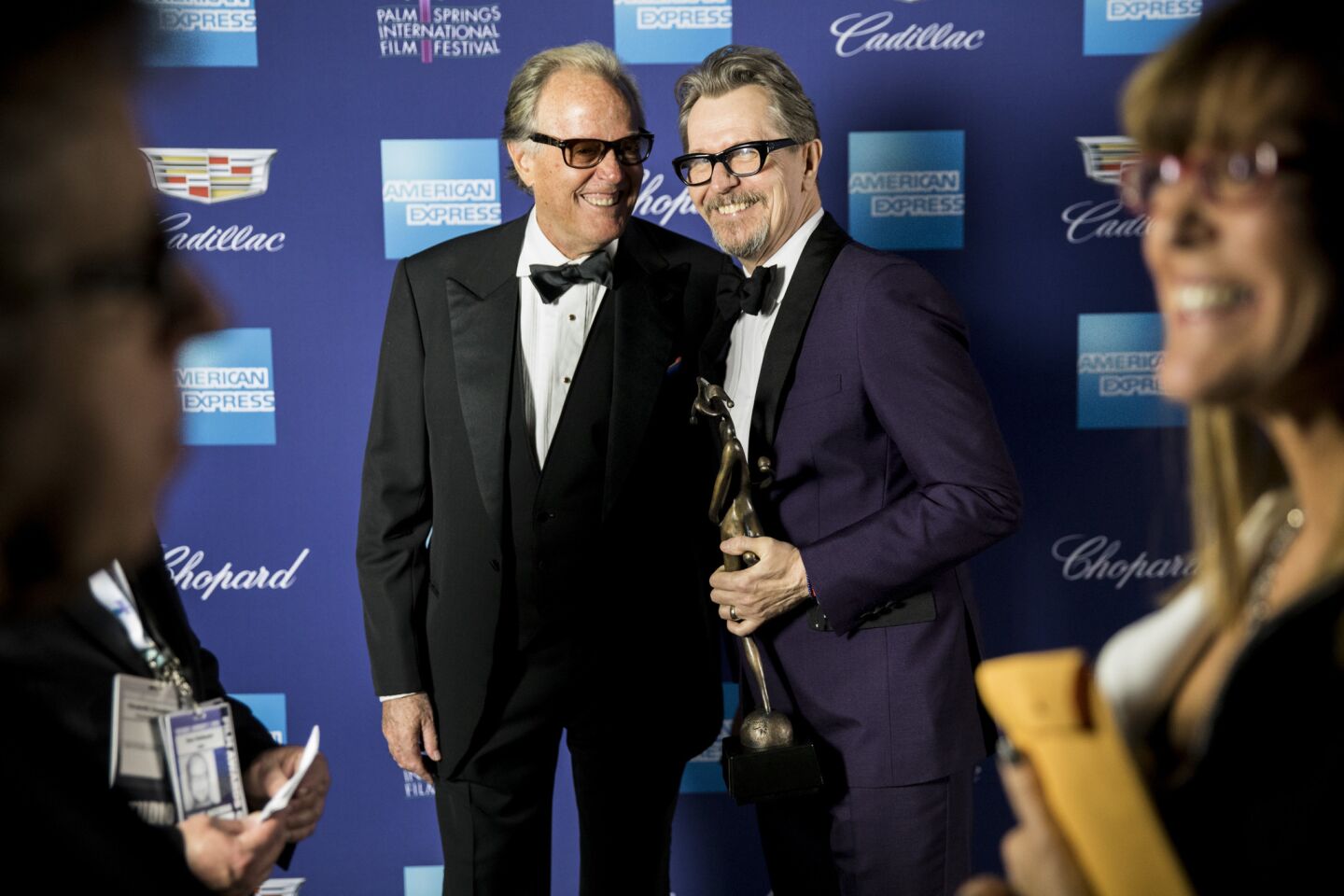 Peter Fonda and Gary Oldman ("Darkest Hour") backstage with Oldman's Desert Palm Achievement Award at the Palm Springs International Film Festival Gala.