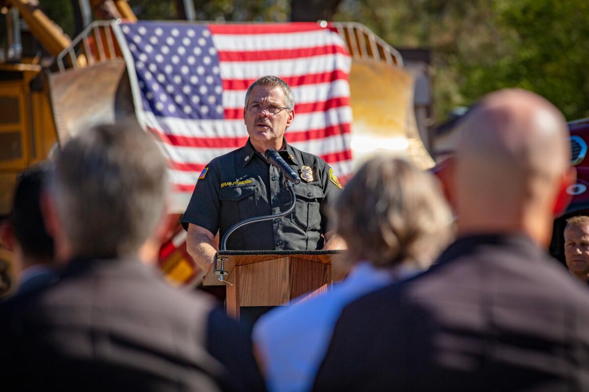 Orange County Fire Authority Chief Brian Fennessy speaks at a news conference Oct. 19.