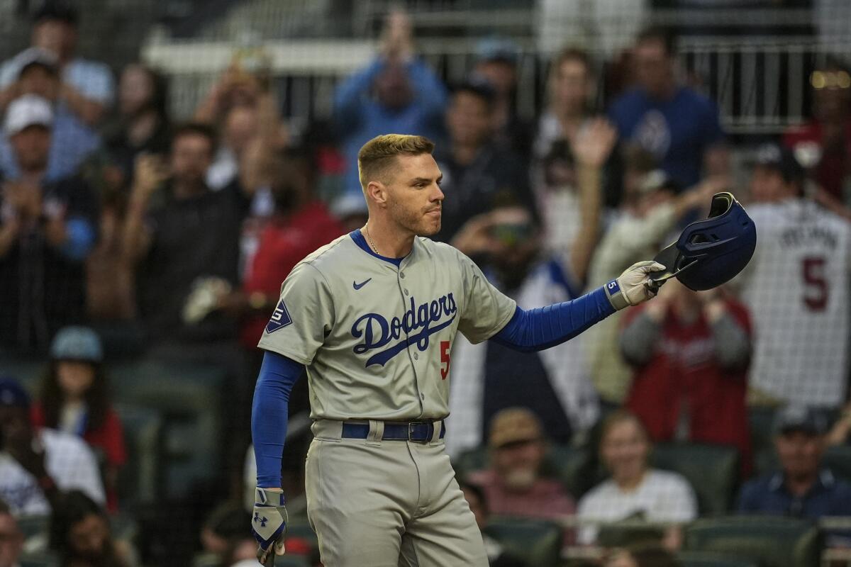 Dodgers first baseman Freddie Freeman receives a standing ovation from Atlanta fans before his first at-bat at Truist Park.